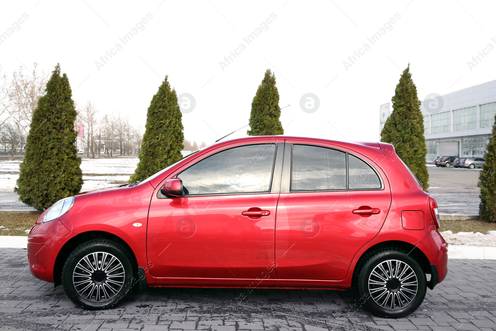 Photo of Clean automobile on city street. Car wash service