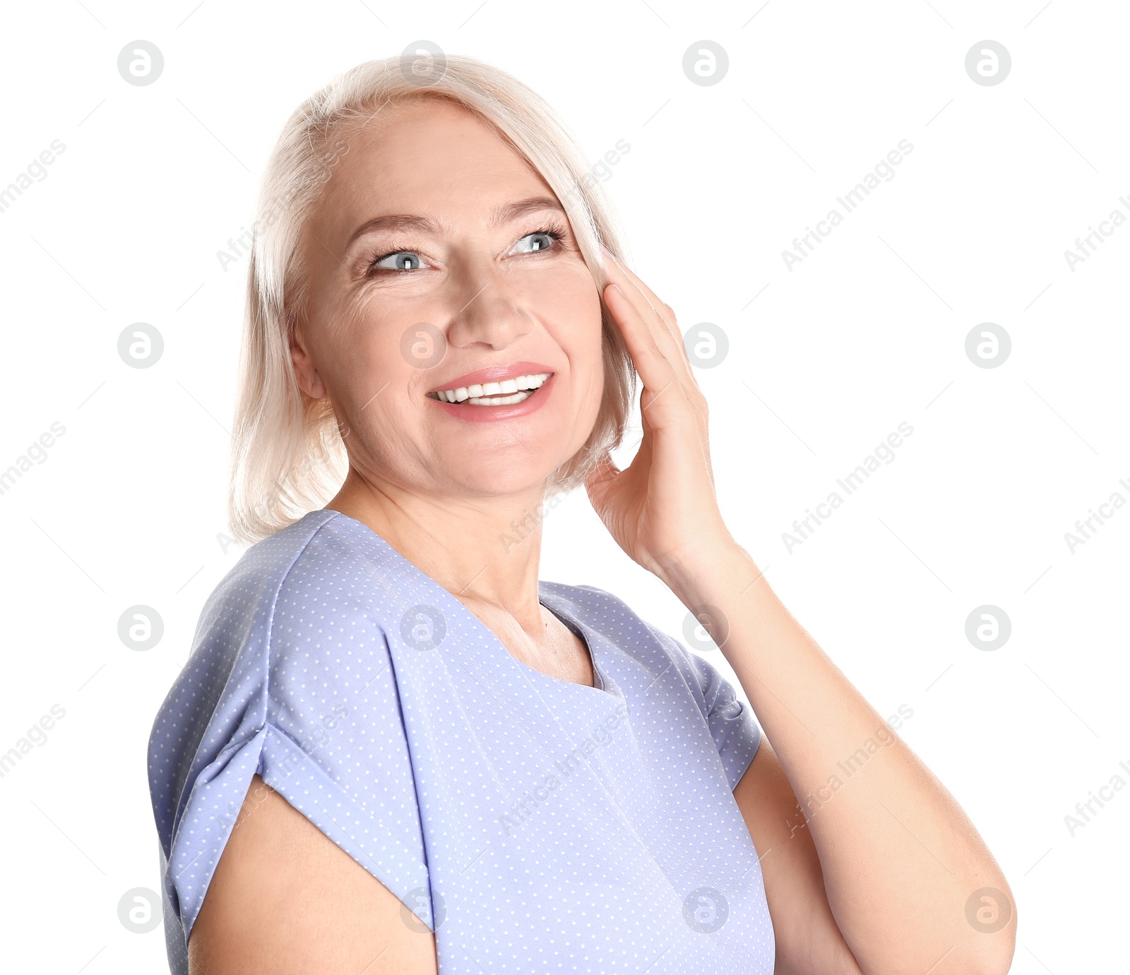 Photo of Portrait of charming mature woman with healthy beautiful face skin and natural makeup on white background