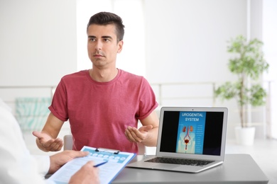 Photo of Man with health problem visiting urologist at hospital