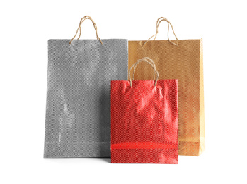 Color paper shopping bags isolated on white. Space for design