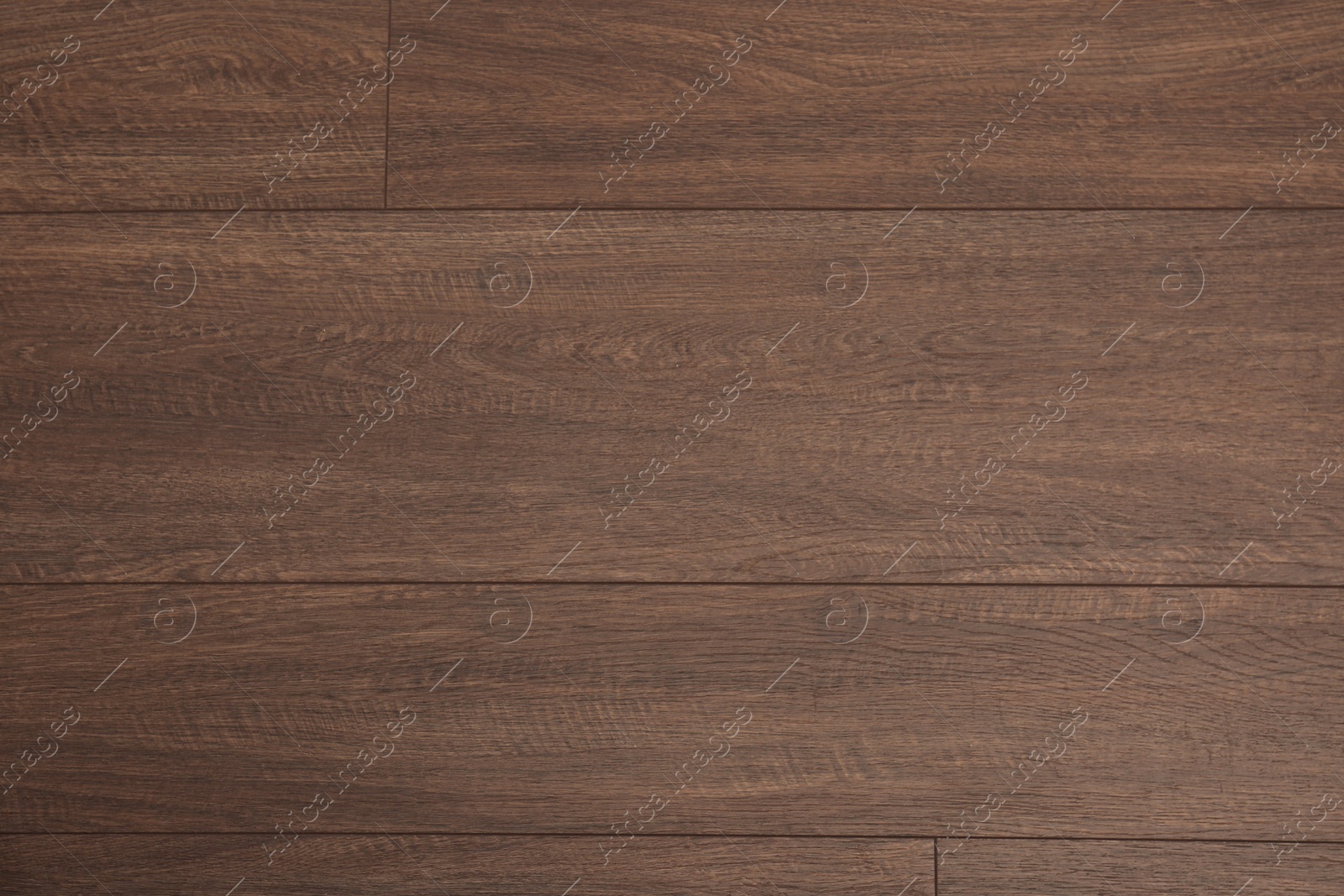 Photo of Clean wooden laminate as background, top view. Floor covering