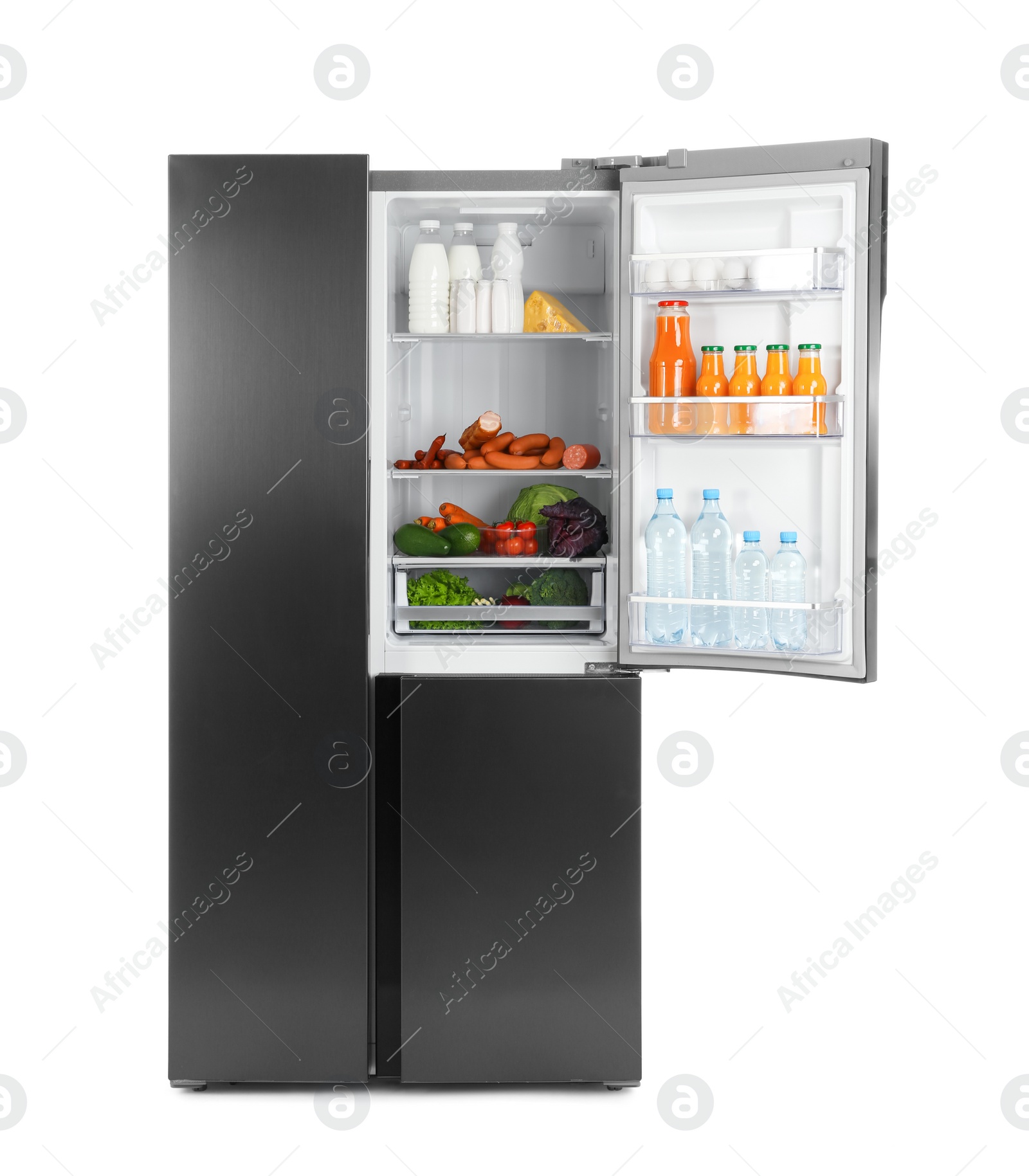 Photo of Open refrigerator filled with products isolated on white