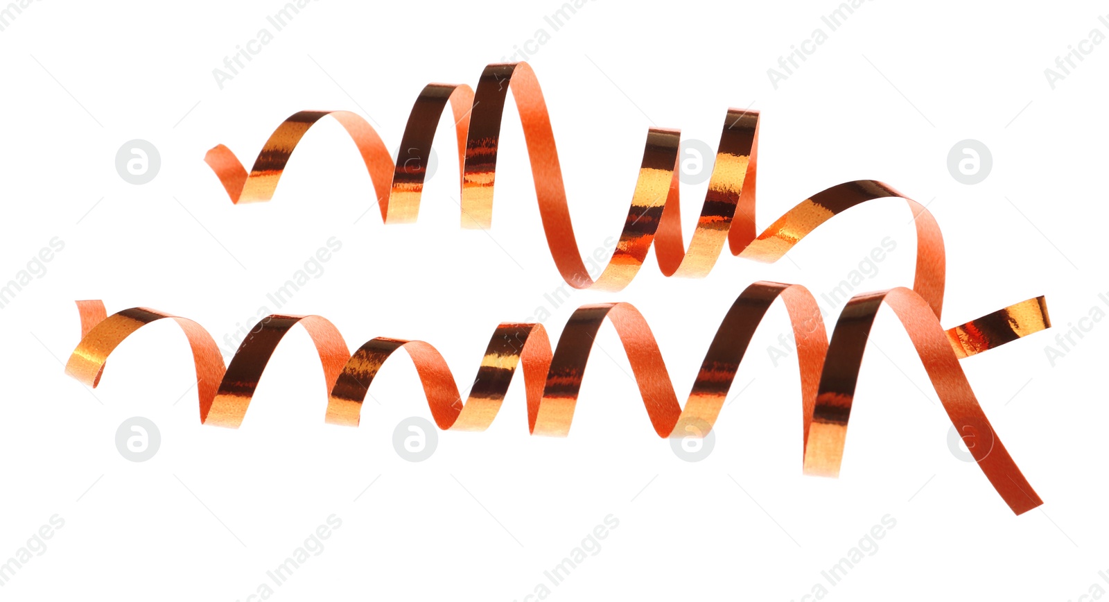 Photo of Shiny serpentine streamers on white background. Festive decor