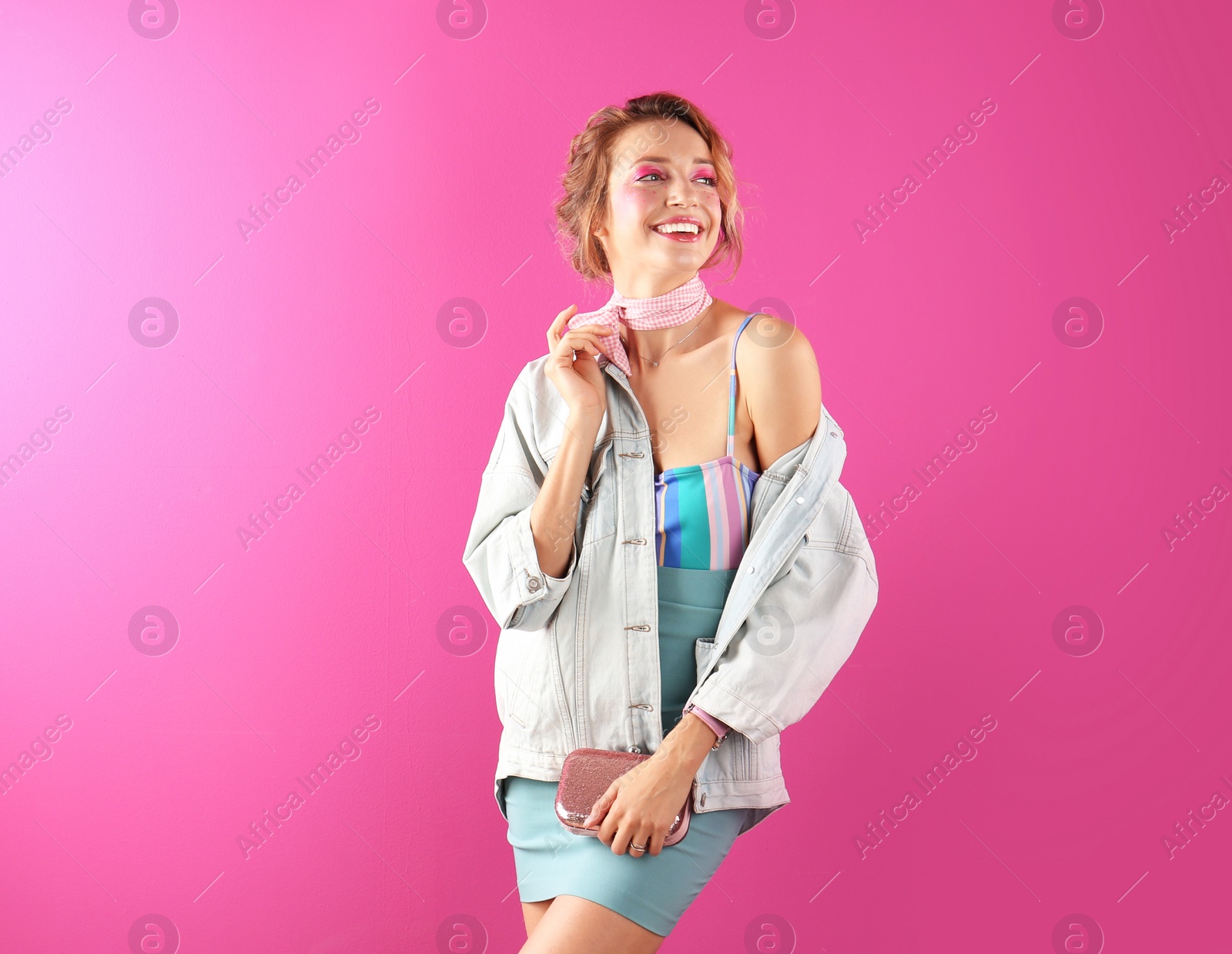 Photo of Beautiful young woman posing on color background. Summer fashion