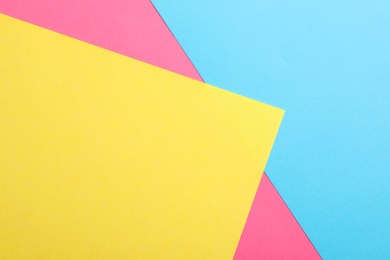 Photo of Colorful paper sheets as background, top view