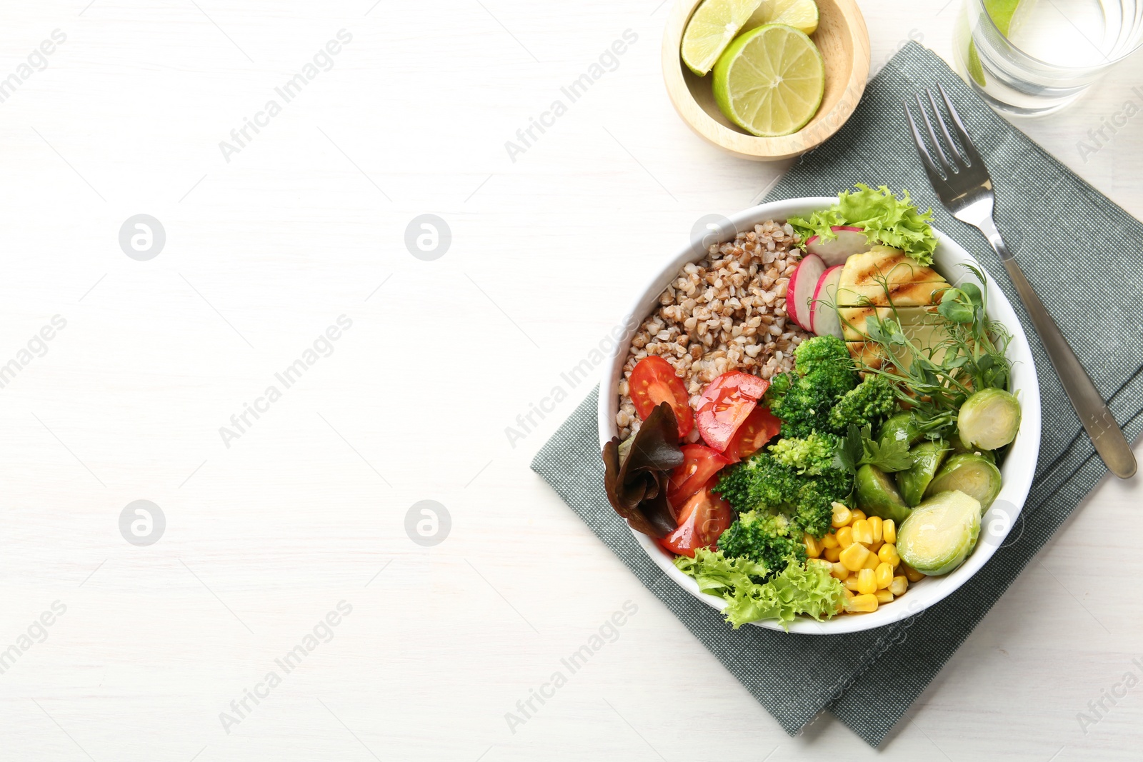 Photo of Healthy meal. Tasty products in bowl on white table, top view. Space for text