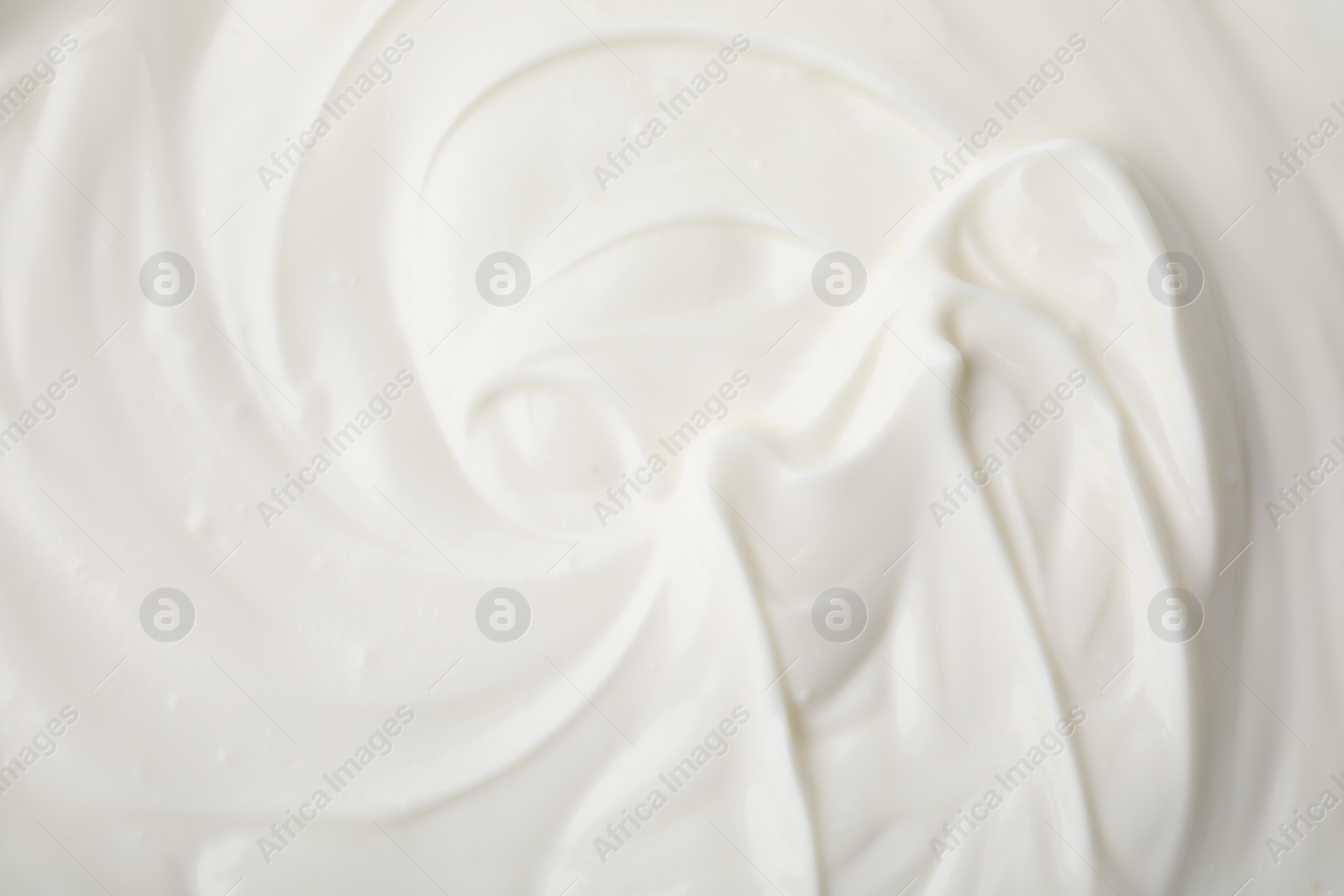 Photo of Delicious natural yogurt as background, top view