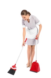 Photo of Young chambermaid with broom and dustpan on white background