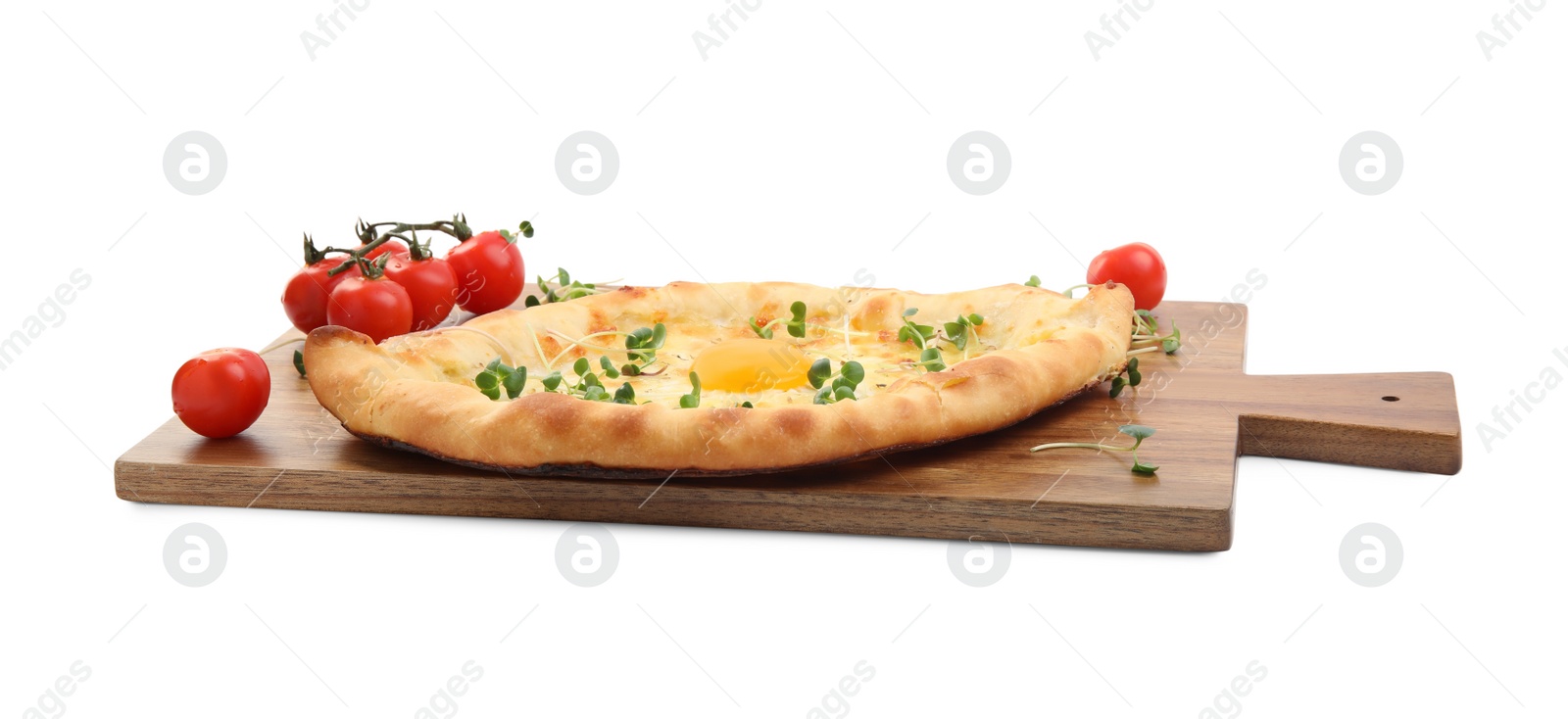 Photo of Fresh delicious Adjarian khachapuri with microgreens and tomatoes on white background