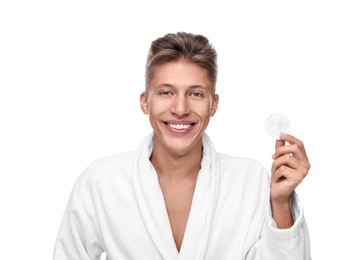 Photo of Handsome man with cotton pad on white background