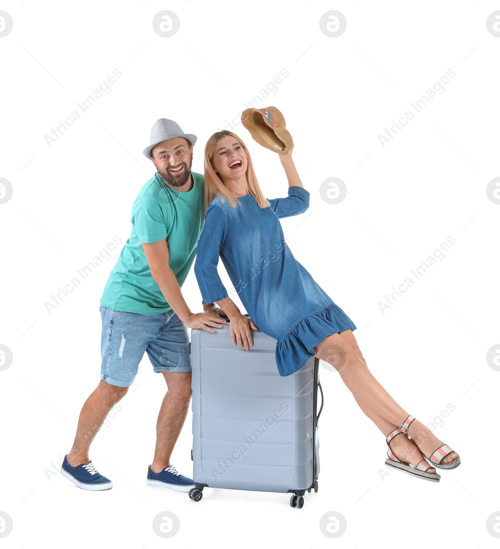 Photo of Couple with suitcase on white background. Vacation travel