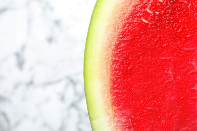 Slice of watermelon on light background, closeup