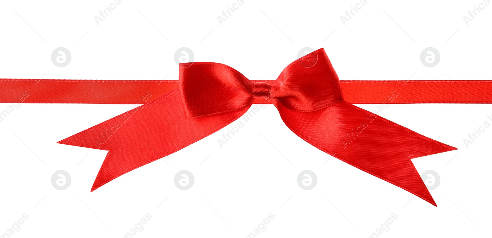 Photo of Red ribbon with bow on white background. Festive decoration