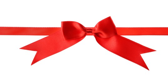 Photo of Red ribbon with bow on white background. Festive decoration