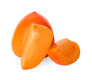 Whole and cut delicious ripe juicy persimmons on white background