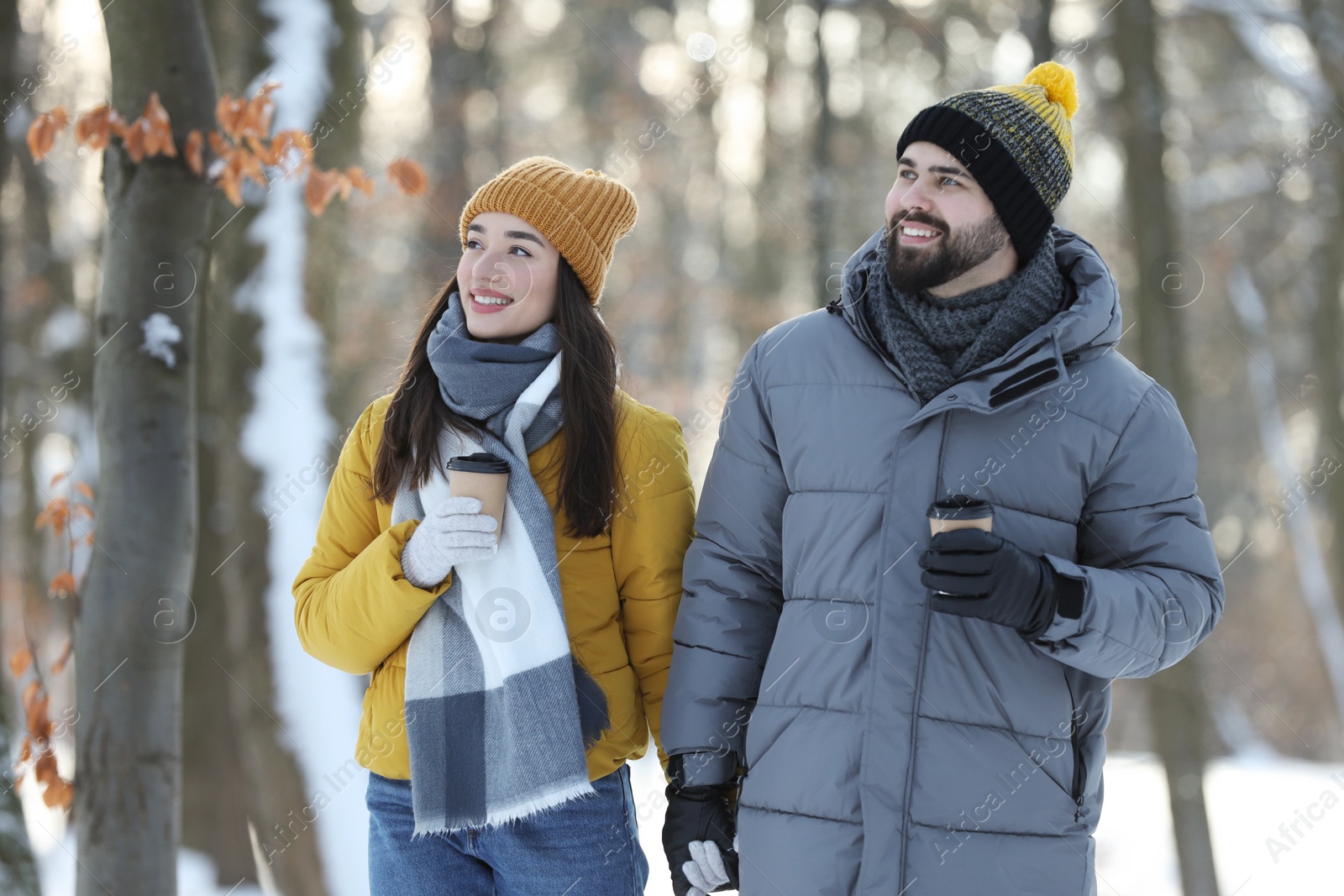 Photo of Beautiful young couple enjoying winter day outdoors