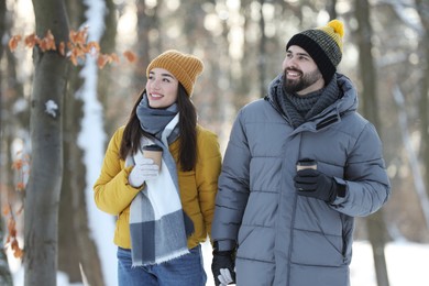 Photo of Beautiful young couple enjoying winter day outdoors