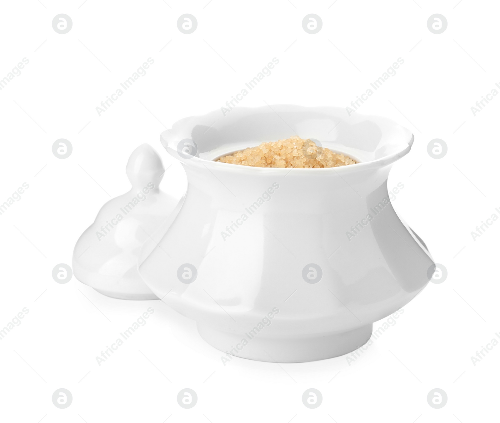 Photo of Ceramic bowl with brown sugar isolated on white