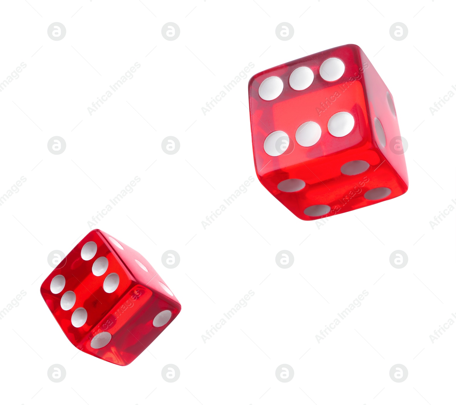 Image of Two red dice in air on white background