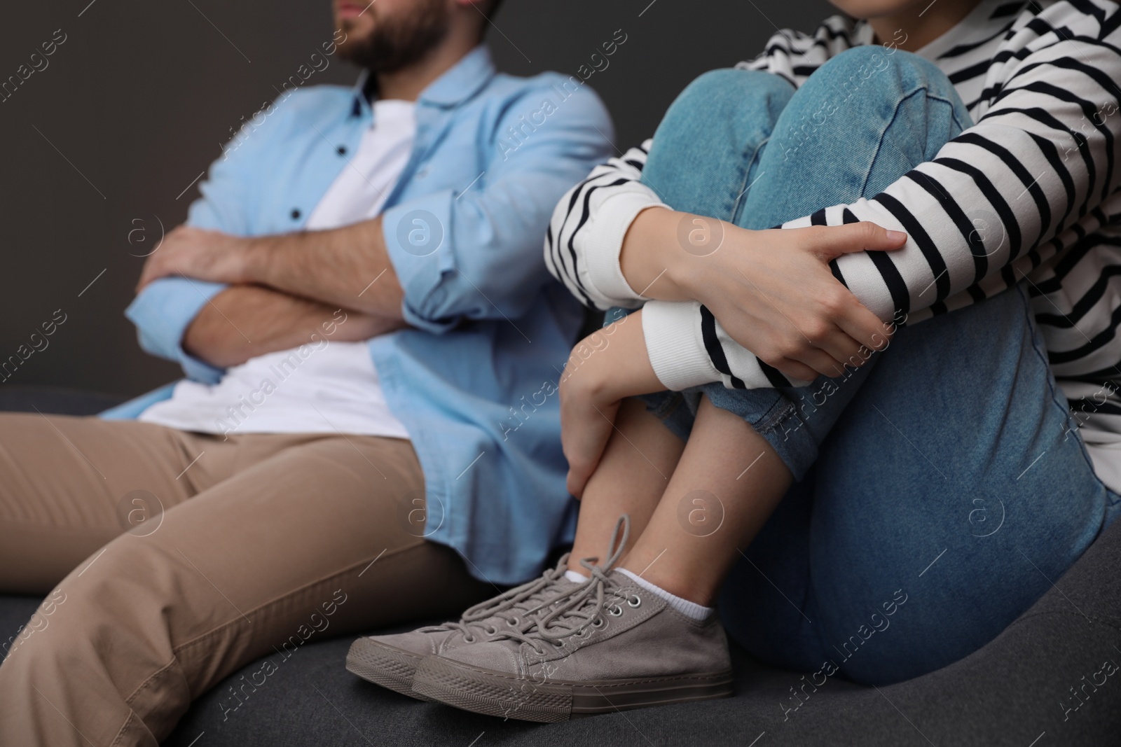 Photo of Couple with problems in relationship at home, closeup