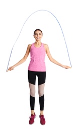 Photo of Full length portrait of young sportive woman training with jump rope on white background