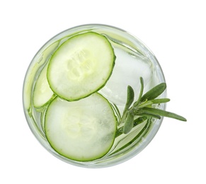 Photo of Glass of refreshing cucumber lemonade and rosemary on white background, top view. Summer drink