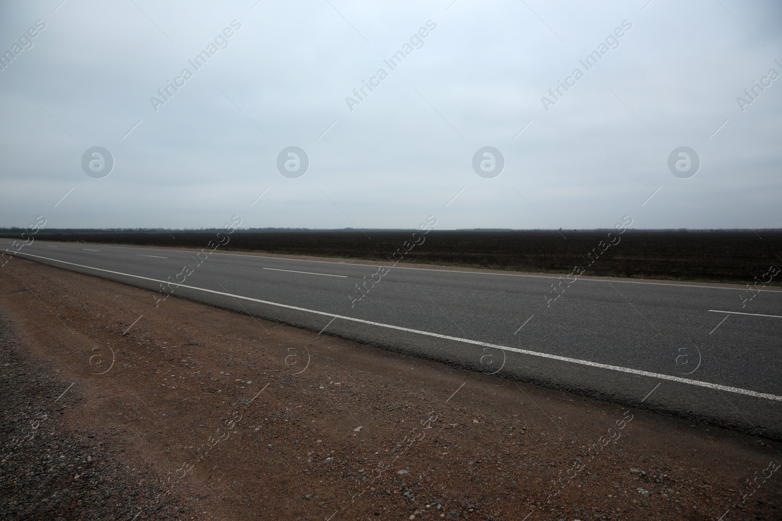 Photo of Beautiful view of asphalt highway without transport