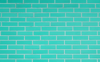 Texture of turquoise brick wall as background