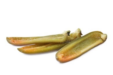 Pieces of pickled green jalapeno on white background