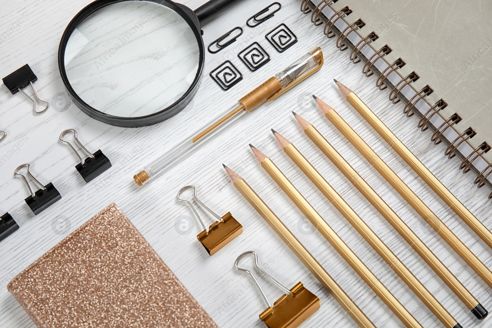 Photo of Different stationery on wooden table. Back to school