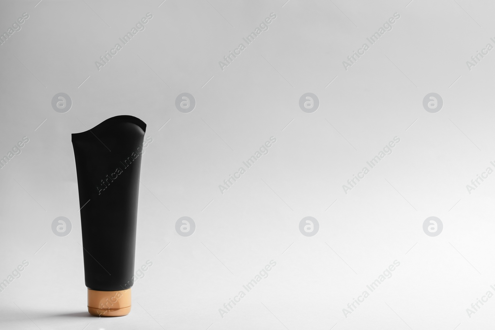 Photo of Men's cosmetic product on light background. Space for design