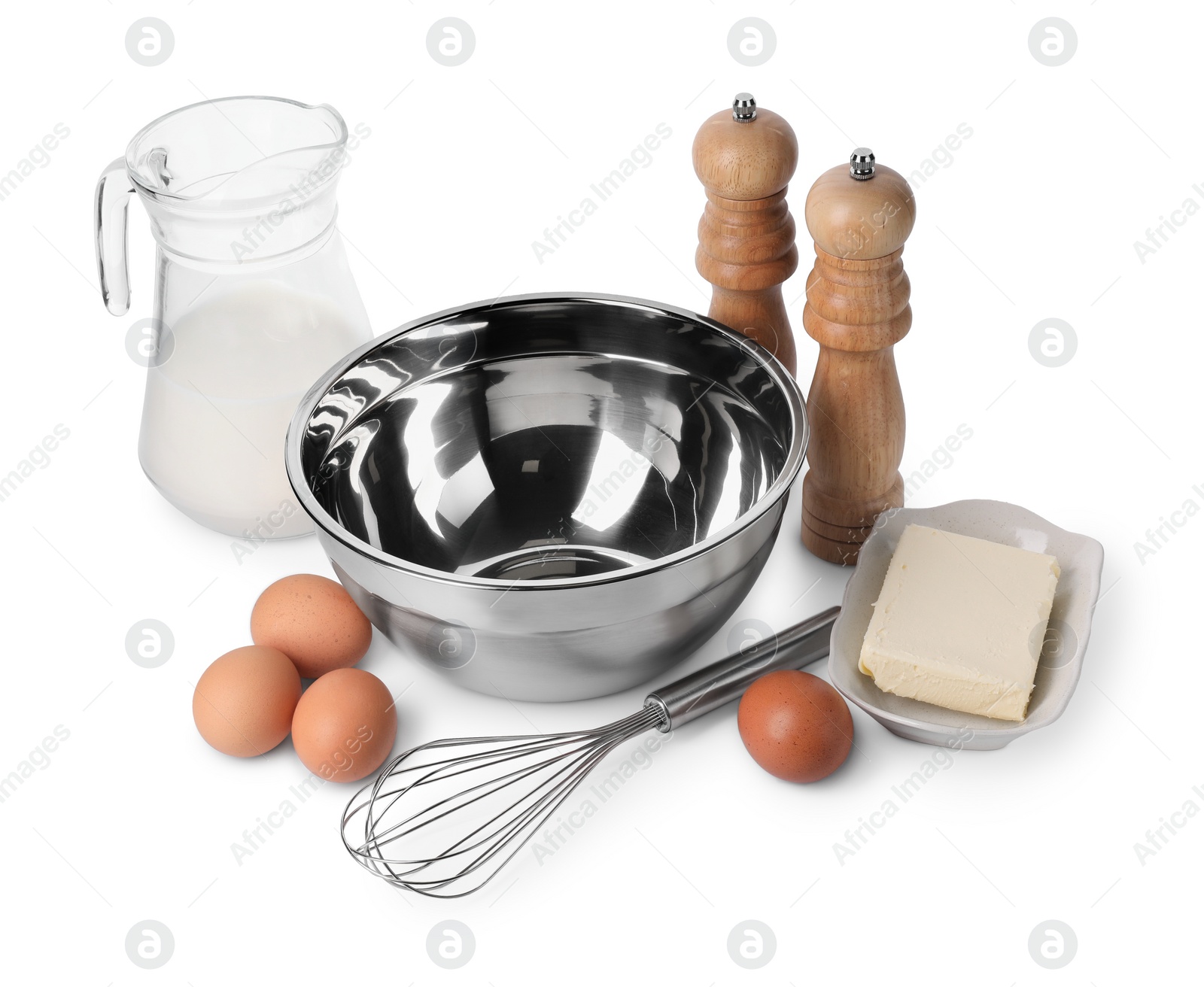 Photo of Metal whisk and dough ingredients isolated on white