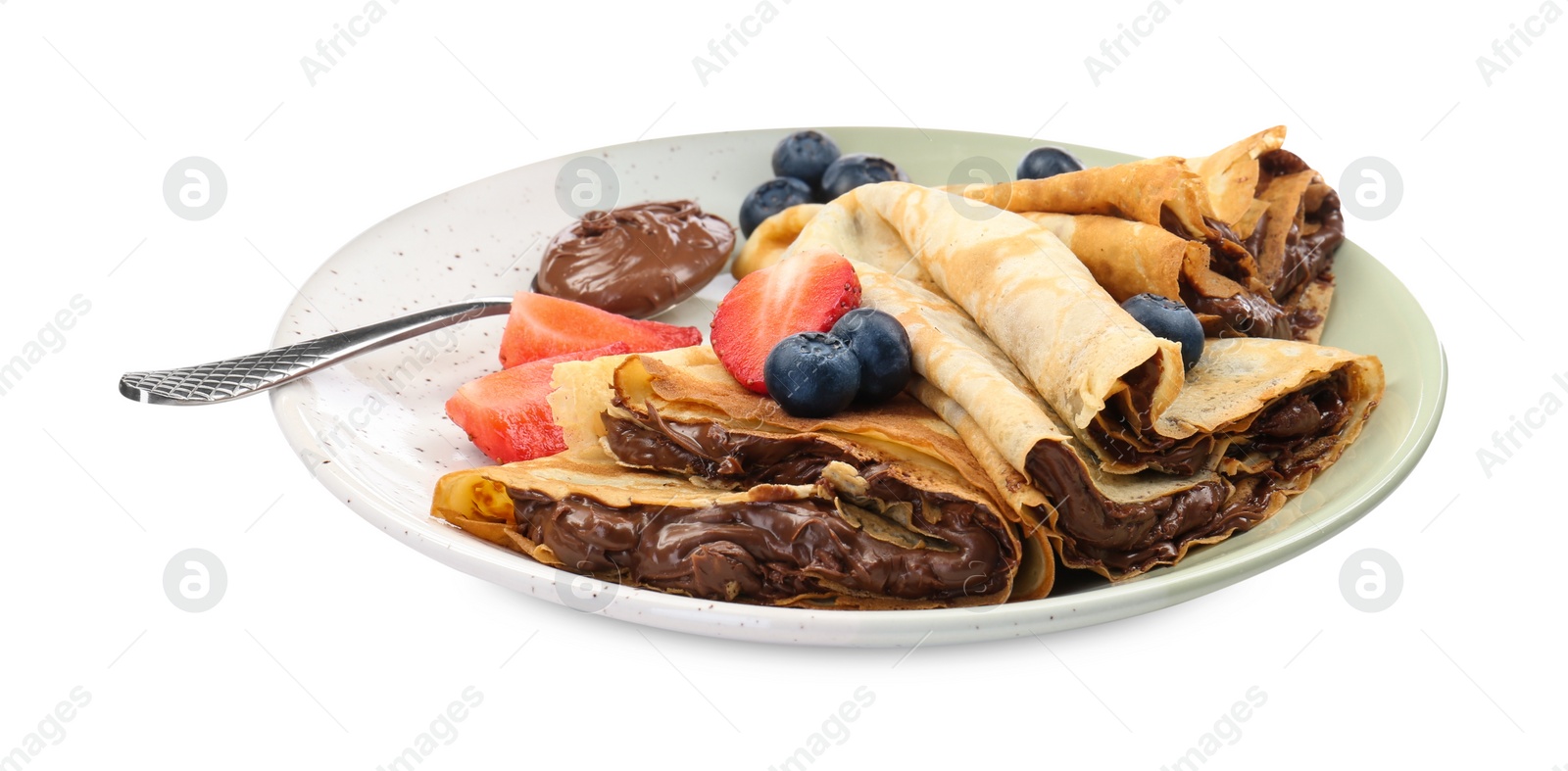 Photo of Tasty crepes with chocolate paste, berries and spoon isolated on white