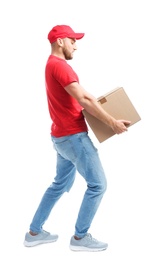 Full length portrait of man in uniform carrying carton box on white background. Posture concept