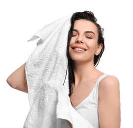 Photo of Happy young woman drying hair with towel after washing on white background