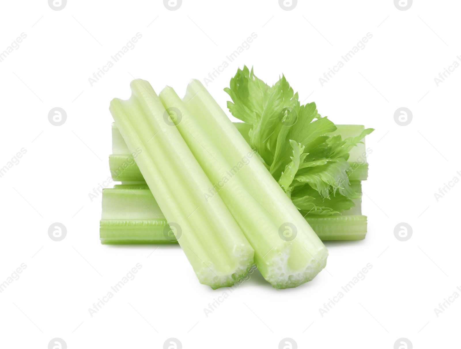 Photo of Fresh cut celery stalks and leaves on white background