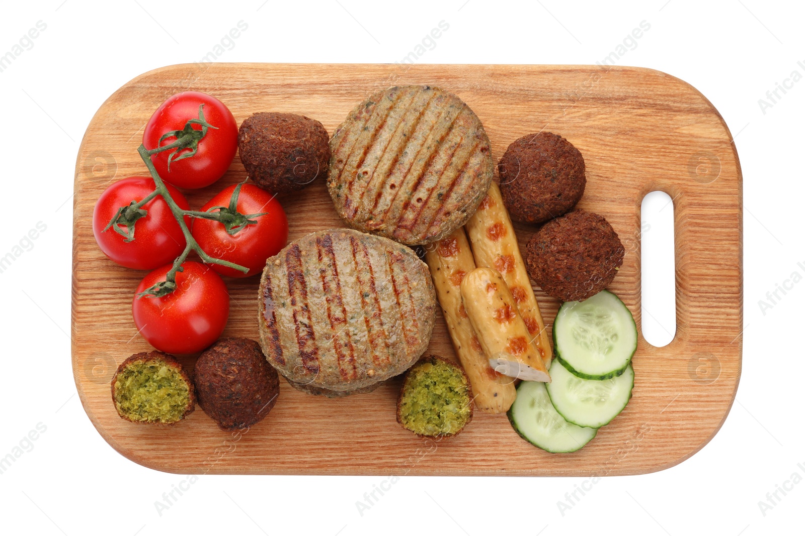 Photo of Serving board with different delicious vegan meat products and fresh vegetables isolated on white, top view