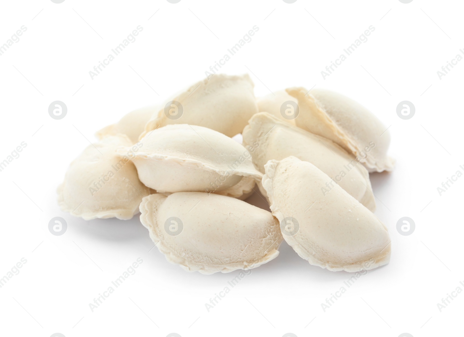 Photo of Heap of raw dumplings on white background