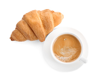 Fresh croissant and coffee on white background, top view