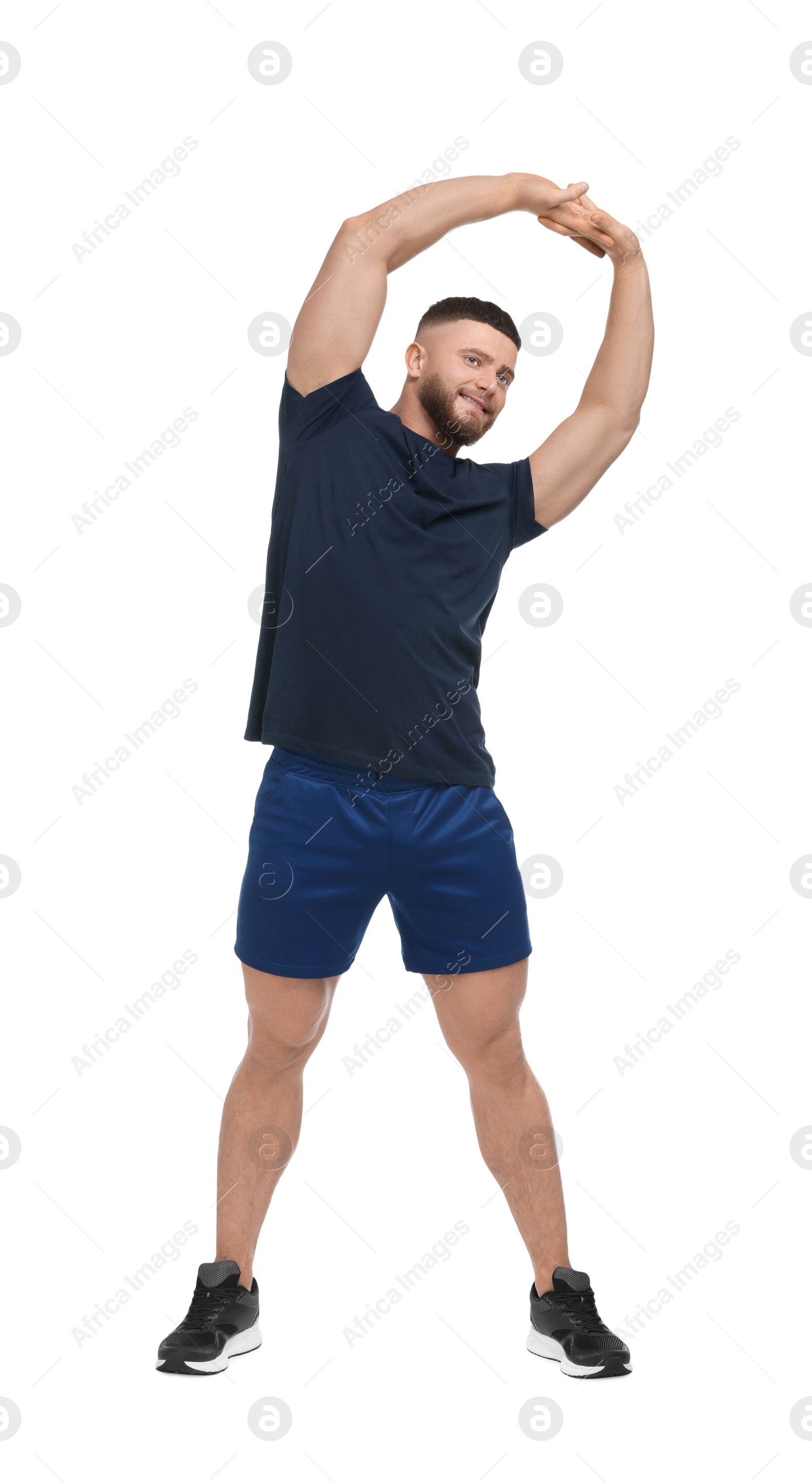 Photo of Man doing stretching on white background. Morning exercise