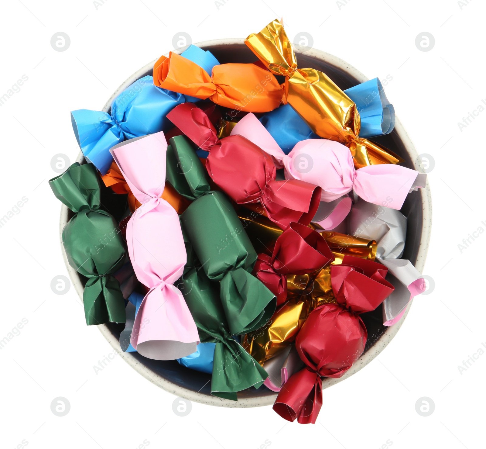 Photo of Bowl with candies in colorful wrappers isolated on white, top view