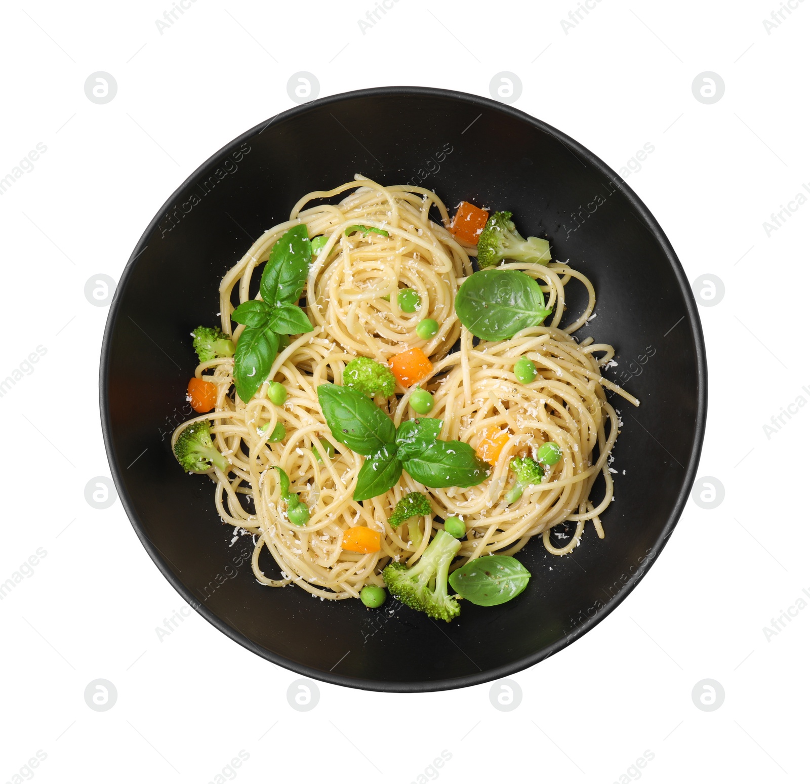 Photo of Bowl of delicious pasta primavera with basil, broccoli and peas isolated on white, top view