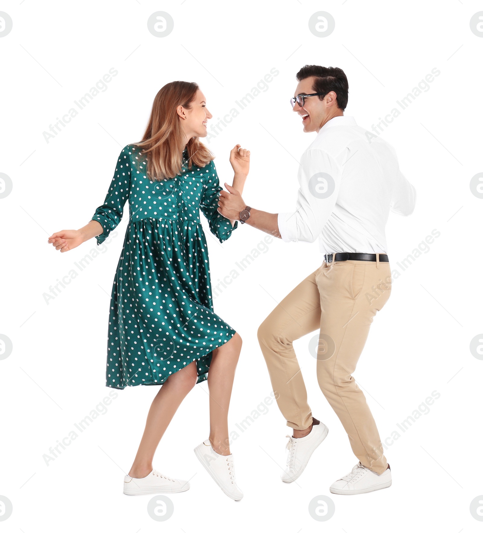 Photo of Beautiful young couple dancing on white background