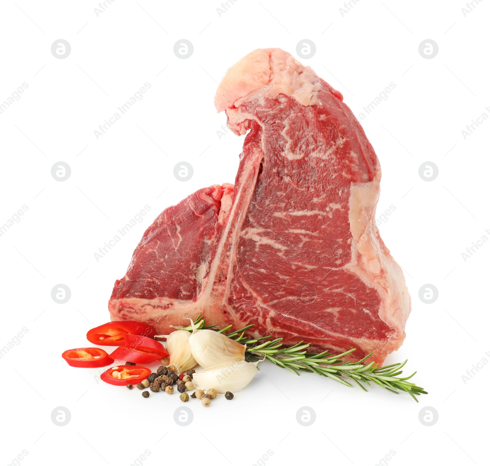 Photo of Raw t-bone beef steak and spices isolated on white