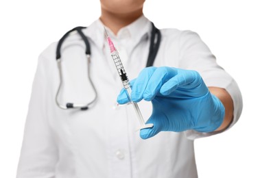 Doctor holding medical syringe on white background, closeup