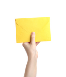 Woman holding yellow paper envelope on white background, closeup