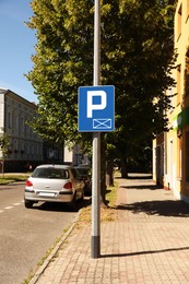 Photo of Parking – reserved space road sign on city street