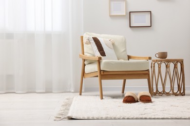 Photo of Stylish living room with soft white carpet and furniture. Interior design