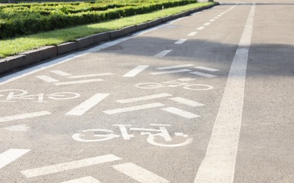 Photo of Bicycle lane with marking on asphalt road