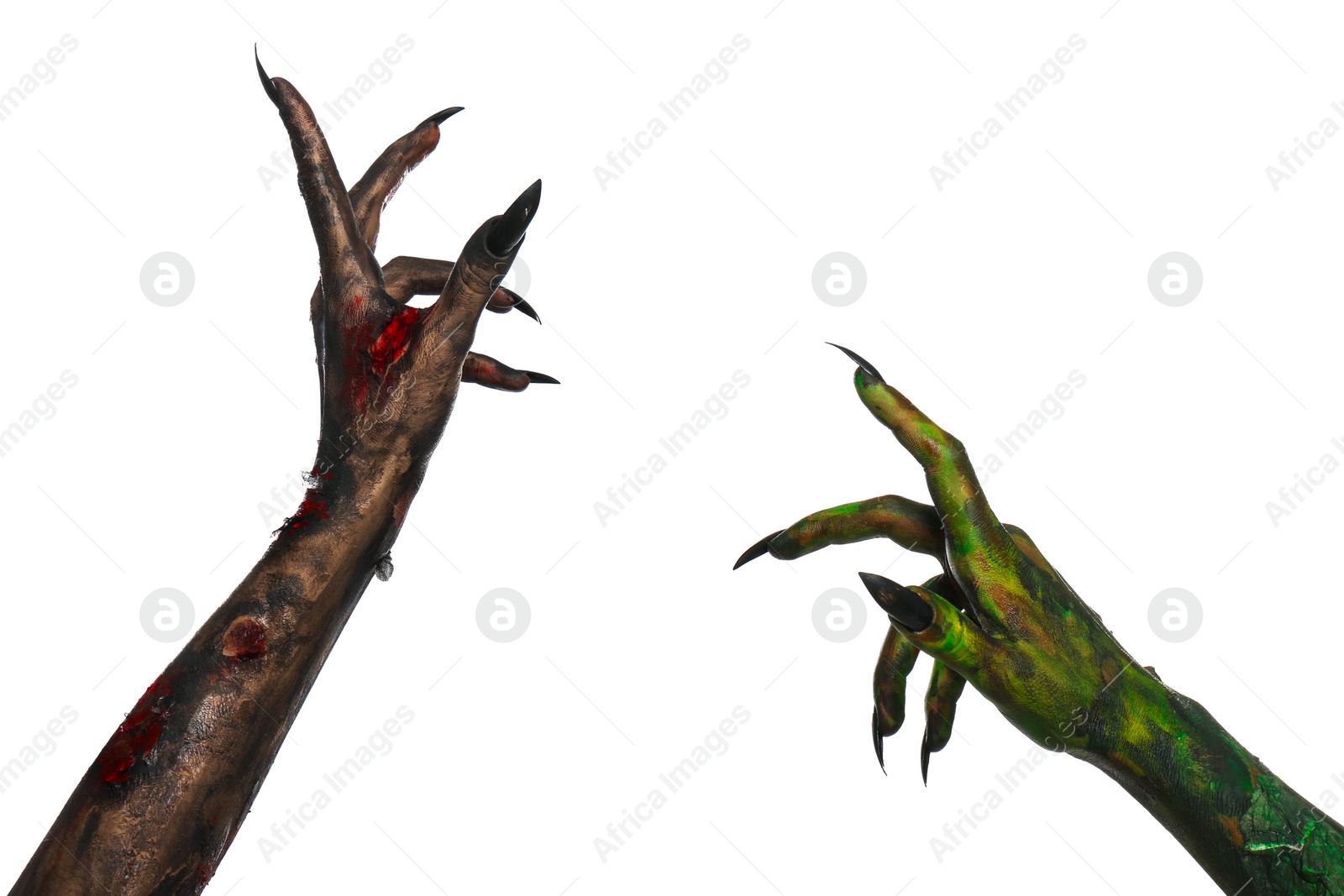 Photo of Scary monsters on white background, closeup of hands. Halloween characters